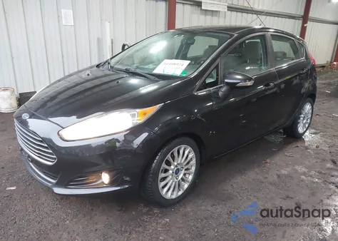 2014 Ford Fiesta Titanium из США, поврежденный, VIN 3FADP4FJ9EM122869